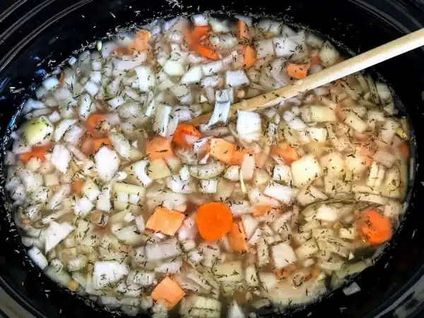 broth, seasonings, and vegetables 