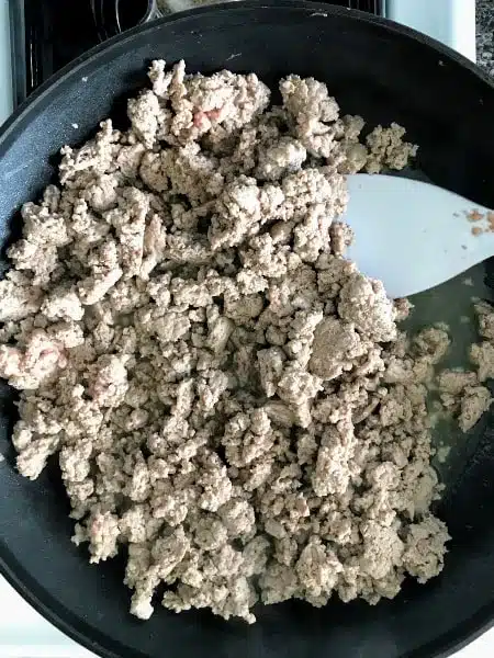 Browning ground turkey in a skillet
