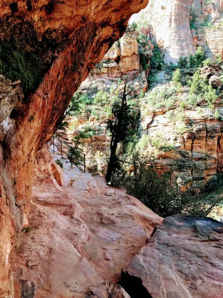 trail carved into rocky cliff.