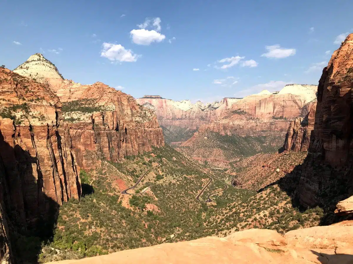 view of red sandstone canyon with road below