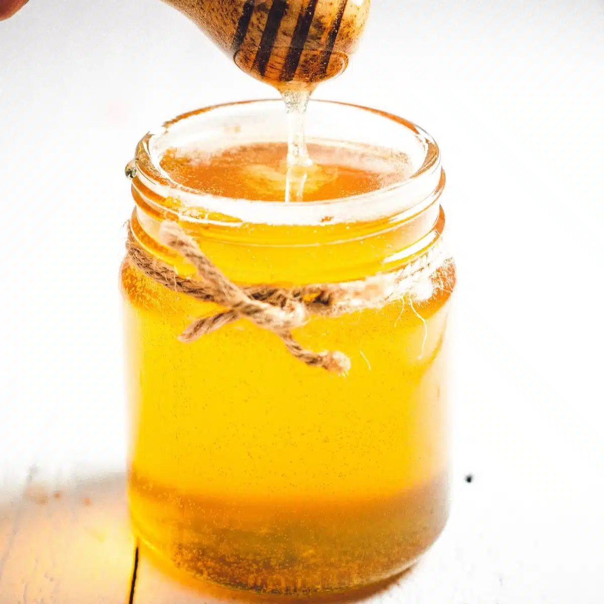 honey in a glass jar.